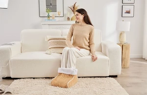 Chauffe-pied électrique et jambe